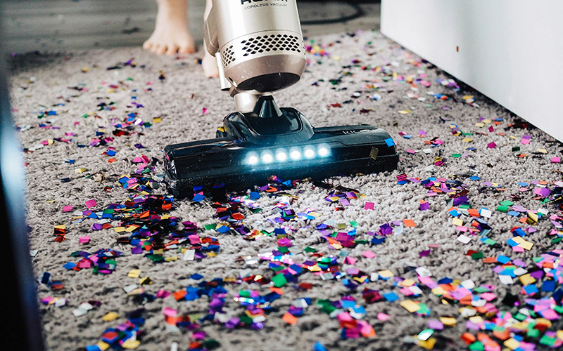 vacuuming messy floor